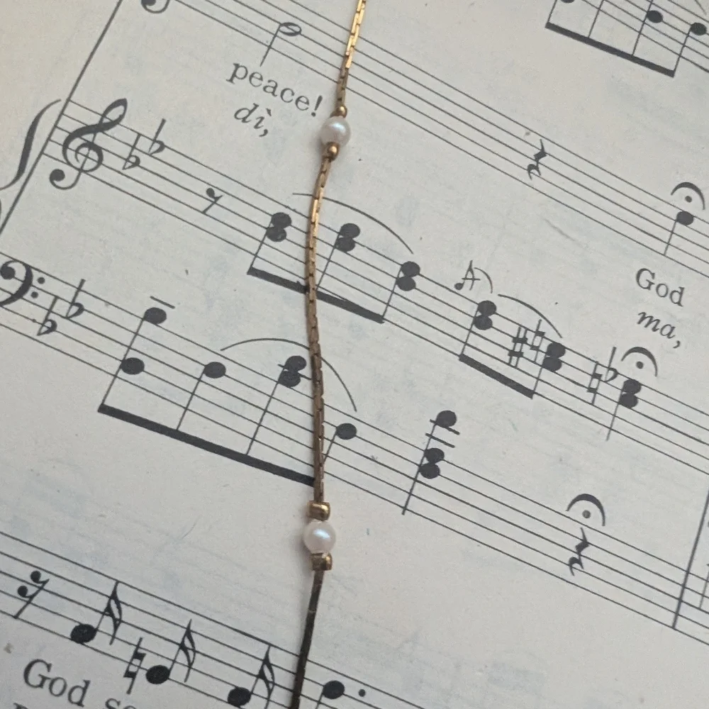 Elegant Gold Necklace with Pearl Accents - Picture 8 of 10